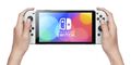Nintendo Switch (modèle Oled) Avec Station D'accueil Et Manettes Joy-con Blanche thumb 7