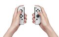 Nintendo Switch (modèle Oled) Avec Station D'accueil Et Manettes Joy-con Blanche thumb 9